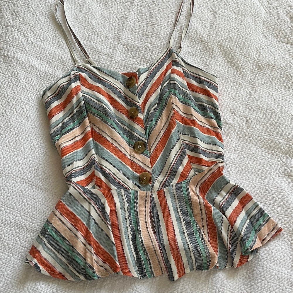 Striped peplum tank with tortoise shell buttons